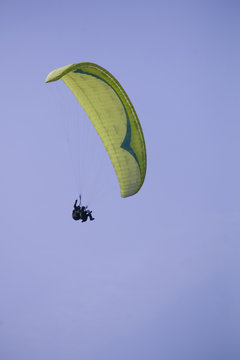 Paraplane on the blue sky background, leisure activity.