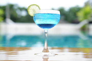 Blue daiquiri cocktails at swimming pool