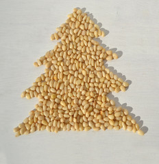 Pine nuts in the form of a Christmas tree