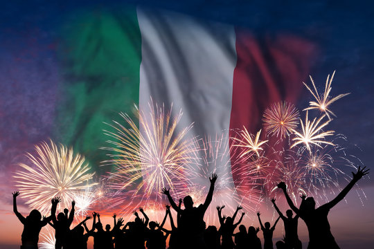 People are looking on fireworks and flag of Italy - Powered by Adobe