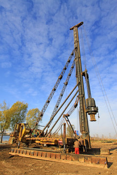 pile driving machine in construction site