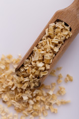 fragrant dried parsnip on a white acrylic background