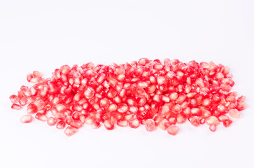 Pomegranate - fresh  fruit seeds on white background