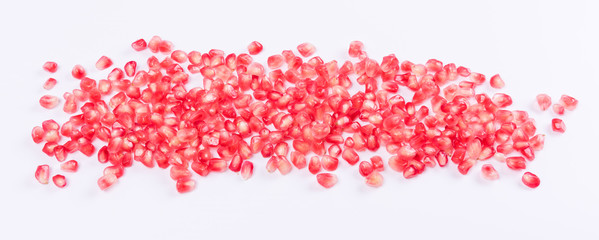Pomegranate - fresh  fruit seeds on white background