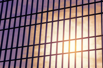 low angle view of modern skyscrapers in business district at sunset