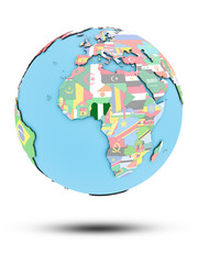 Nigeria on political globe with flags