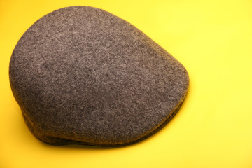 Vintage Autumn Mans Hat yellow background 