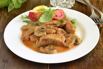 Beef Stroganoff with mushrooms and fresh vegetables