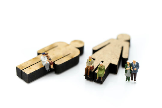 Miniature people : Old people with sigh of human using for concept of Older Peoples Day.