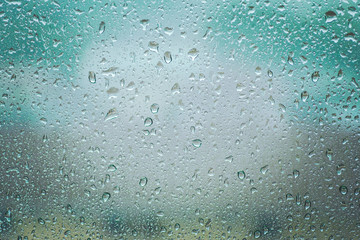 rain drops on glass clear window close up