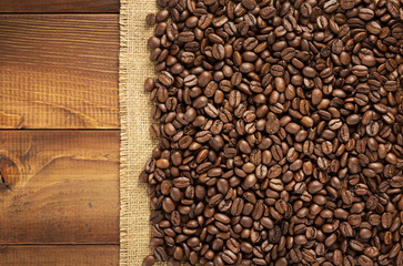 coffee beans on wooden background