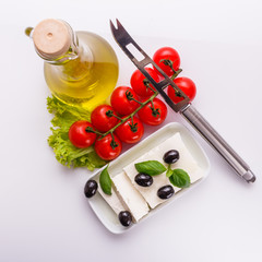 A piece of feta cheese on a white background