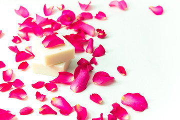 rose flower flora petals with spa herbal soap on white background