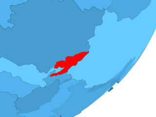 Fototapeta premium Map of Kyrgyzstan on blue political globe