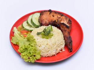 a set of a plate of chicken rice