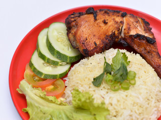 a set of a plate of chicken rice