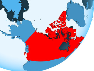 Map of Canada on blue political globe
