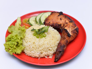 a set of a plate of chicken rice
