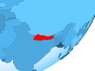 Map of Nepal on blue political globe