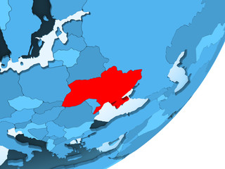 Map of Ukraine on blue political globe
