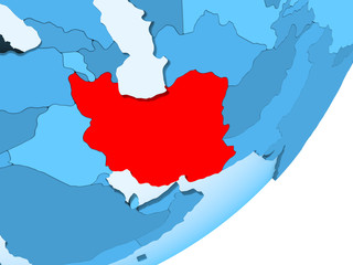 Fototapeta premium Map of Iran on blue political globe