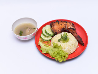 a set of a plate of chicken rice