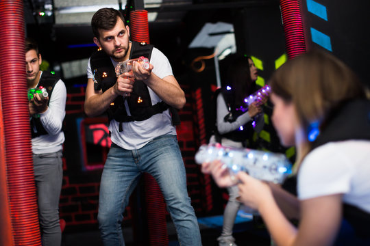 Young man on laser tag arena