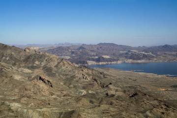 Aerial view of rocky formations and Lake Mead/Colorado River, Nevada/Arizona