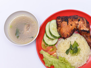 a set of a plate of chicken rice