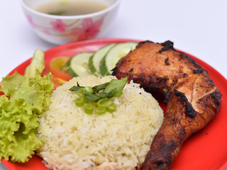 a set of a plate of chicken rice