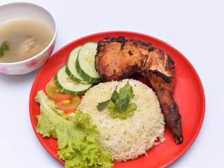 a set of a plate of chicken rice