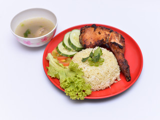a set of a plate of chicken rice