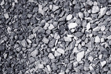 the continuous space filled with granite gravel texture , White pebbles stone background, gravel stone wallpaper, landscape concept pattern . Mountain cobblestone  ground texture.