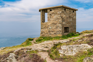 Fototapeta na wymiar Old Coast Guard hut near South Stack Lighthouse, Anglesey, Gwynedd, Wales, UK