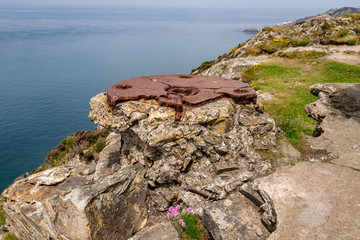 Anglesey coast near Holyhead, with North Stack in the background, Gwynedd, Wales, UK