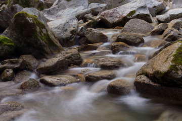 water flowing over rocks