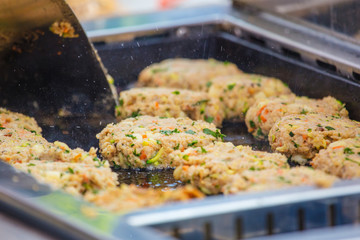 Chef making Vegitabeles pads for Burger