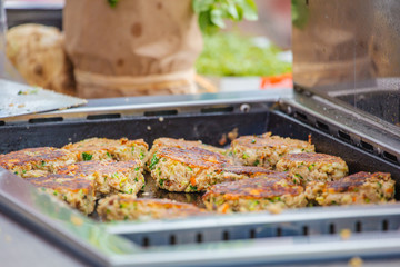 Chef making Vegitabeles pads for Burger