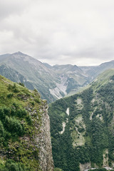 Caucasian Mountain in summer. Cross Pass in Georgia. Gudauri District. Source of Aragvi River. 