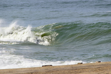 Wave on the shorebreak in Copacabana in Rio de Janeiro