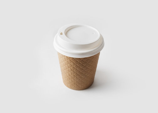 Blank take away kraft coffee cup with cap.