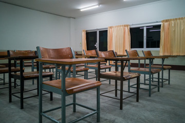 University classroom with many wooden chairs