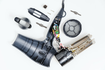 Hairdryer in a disassembled condition. - obrazy, fototapety, plakaty