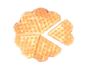 Delicious sweet Belgian waffles in the form of hearts on a white isolated background. top view