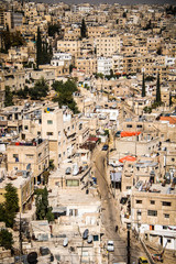 Fototapeta na wymiar AMMAN, JORDAN - Nov 2009: A view of the bustling, busy city of Amman in Jordan from the citadel