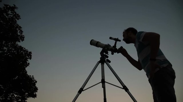 Astronomer searching for stars and planets.