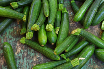 Close up fresh green zucchini on retail display