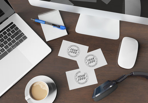 Three Business Cards on Wooden Desk Mockup 
