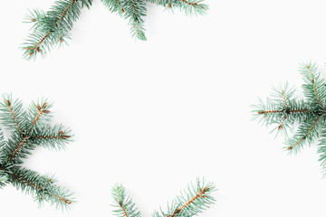 Christmas composition. Frame made of fir branches on white background. Flat lay, top view, copy space. 