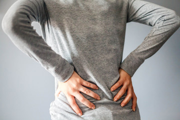 Back pain low in Woman